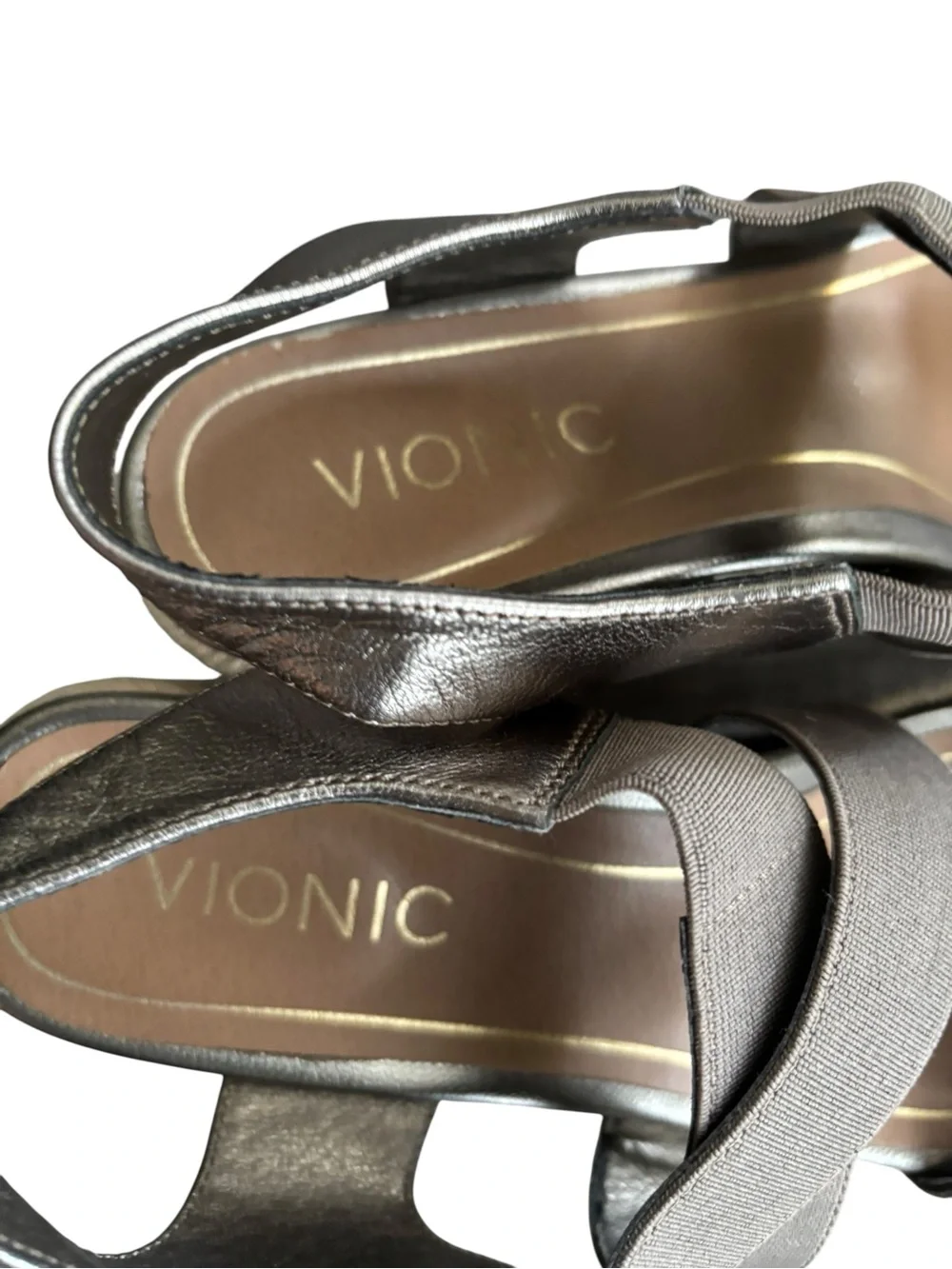 Vionic Tulum Ainsleigh wedge sandals, featuring a metallic bronze leather upper